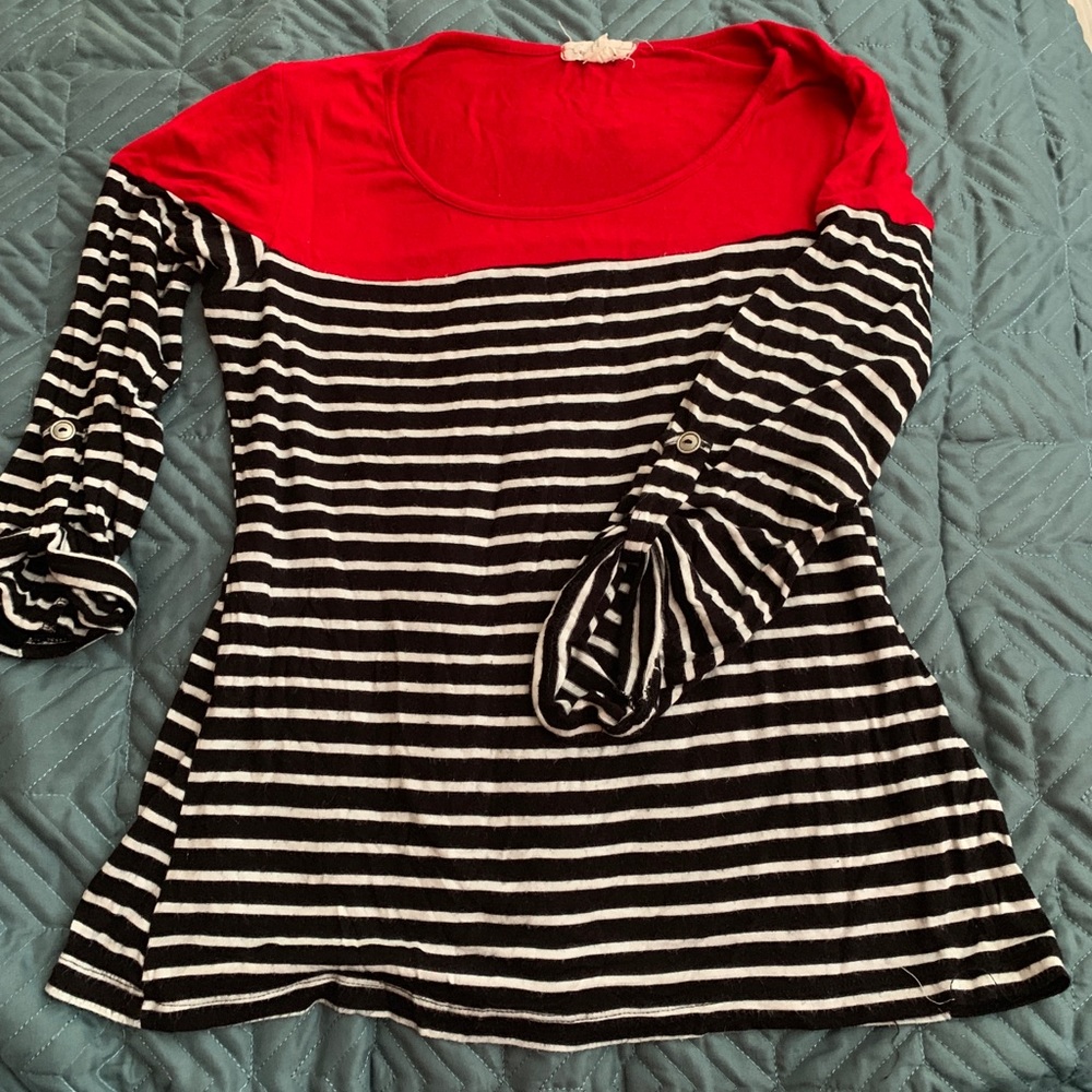 Cute black with white stripes, and red shirt